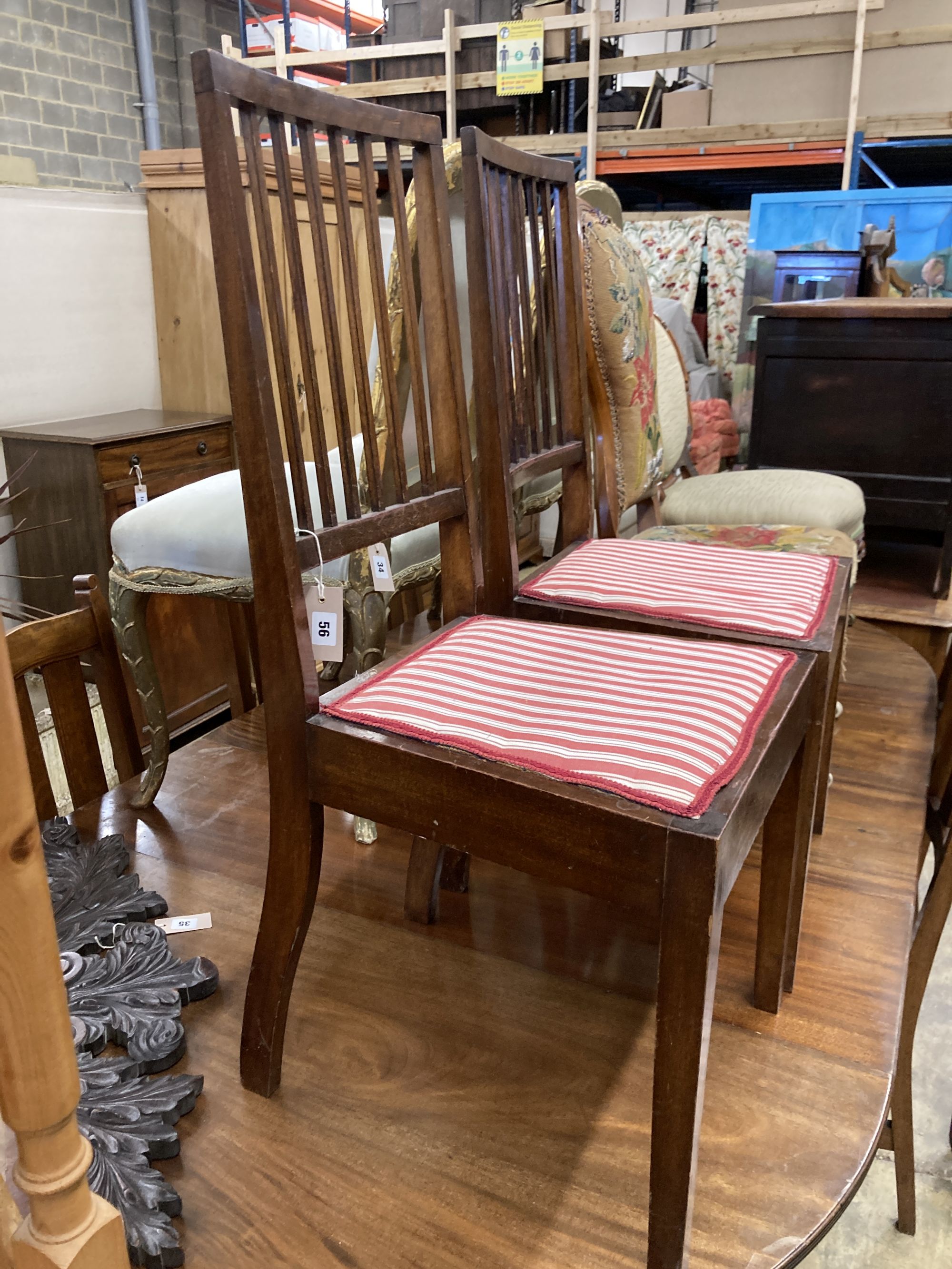 A pair of mahogany bedroom chairs, labelled Beard Watson, Sydney